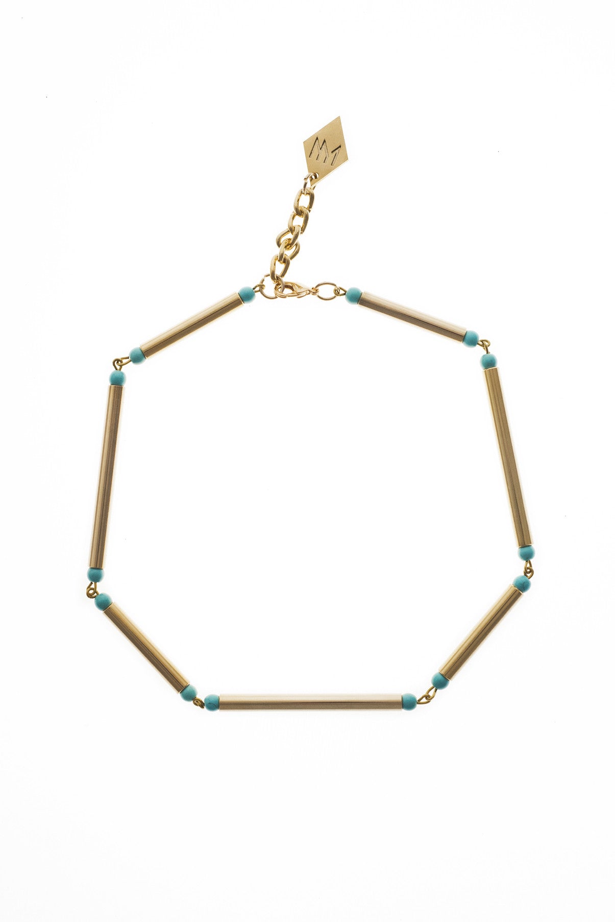 Gold edition: made of hand-cut and galvanized brass and turquoise.