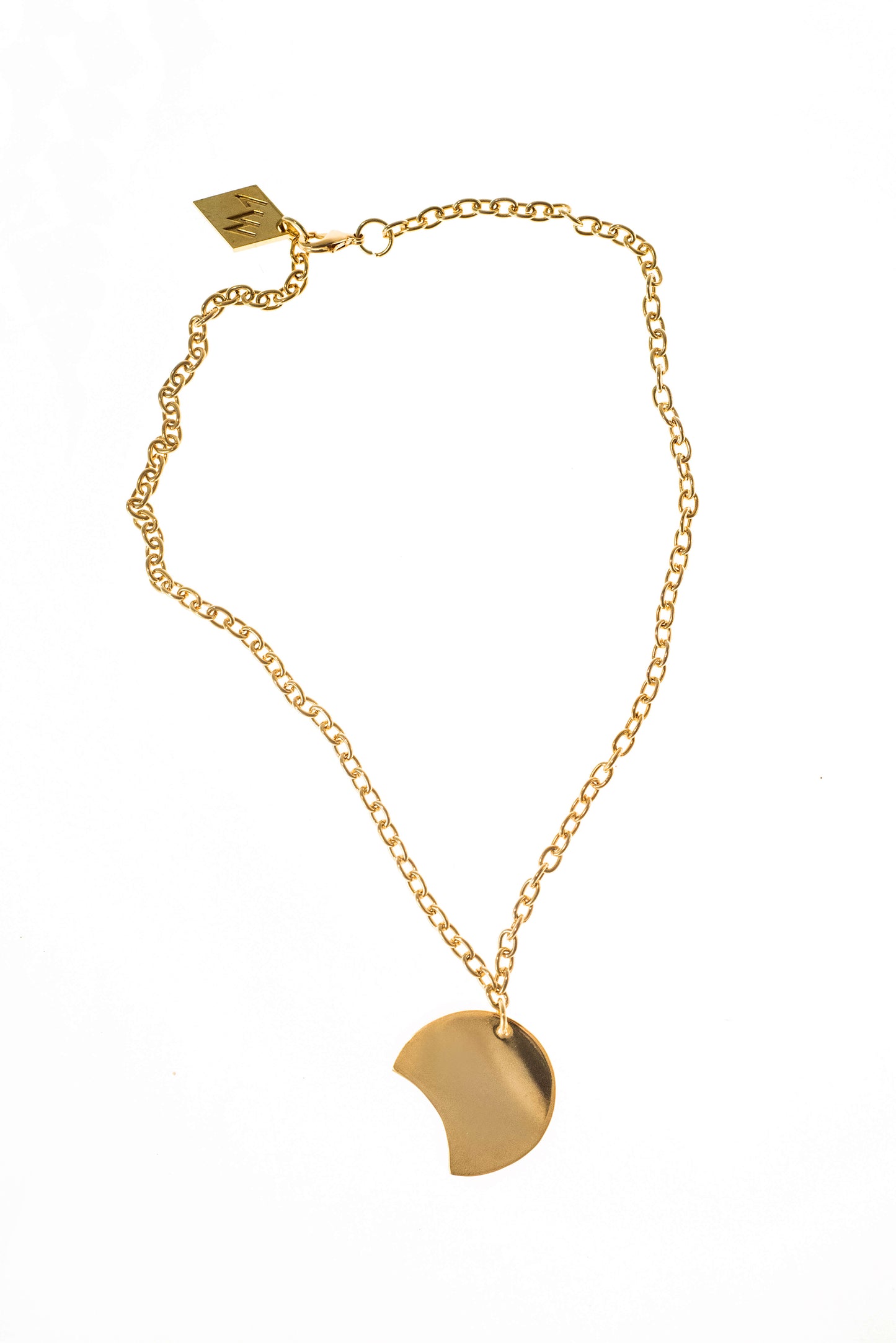 Necklace made of hand cut and 24K gold-plated brass and anchor chain.